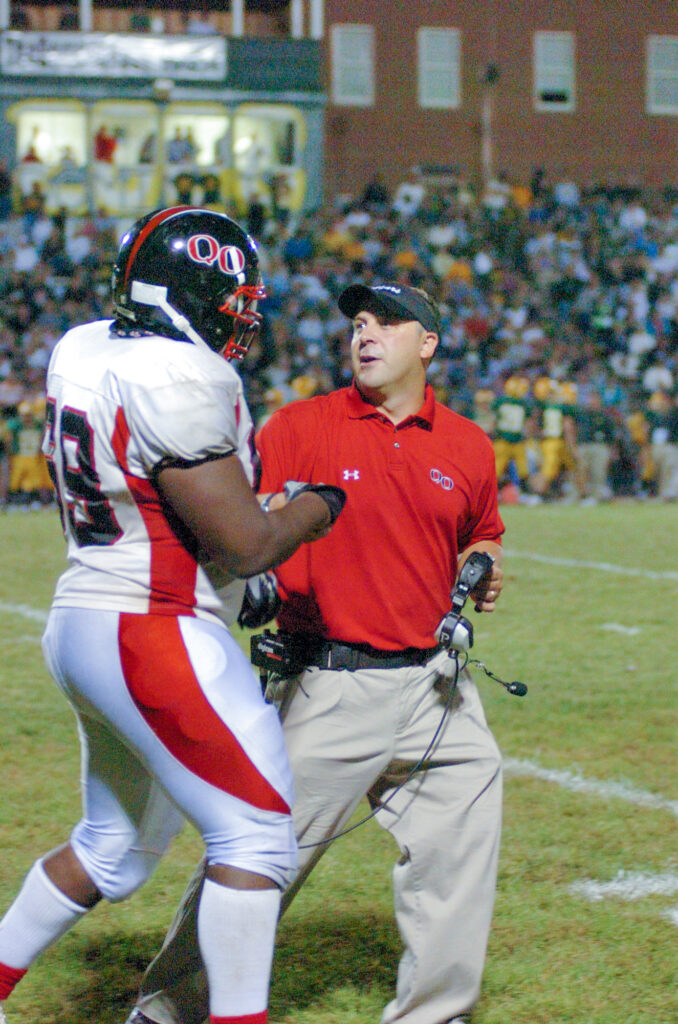 photo of Zach Kerr and QO Coach Dave Menacarini in 2007