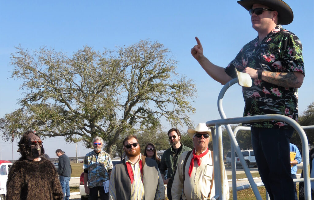 photo of race official briefs rally participants