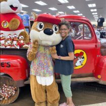 4. Buc-ee’s mascot, a buck-toothed beaver (after the “Beaver” founder) poses with a patron.