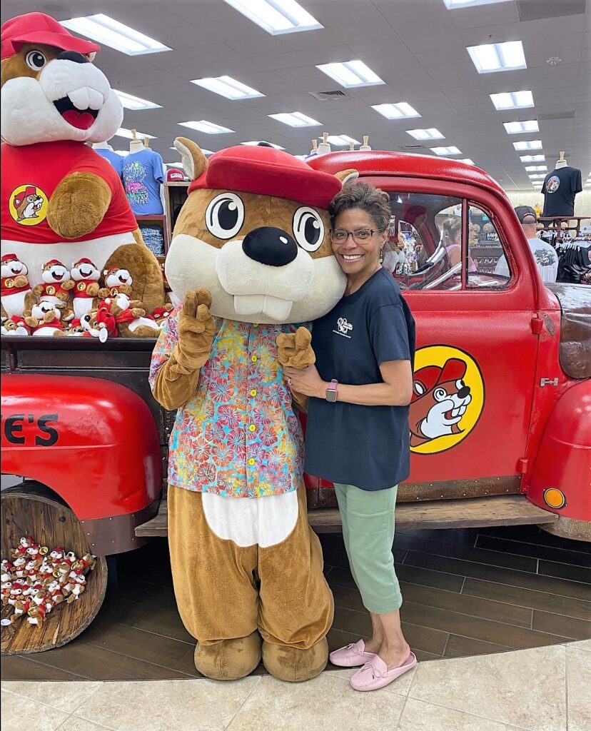 4. Buc-ee’s mascot, a buck-toothed beaver (after the “Beaver” founder) poses with a patron.