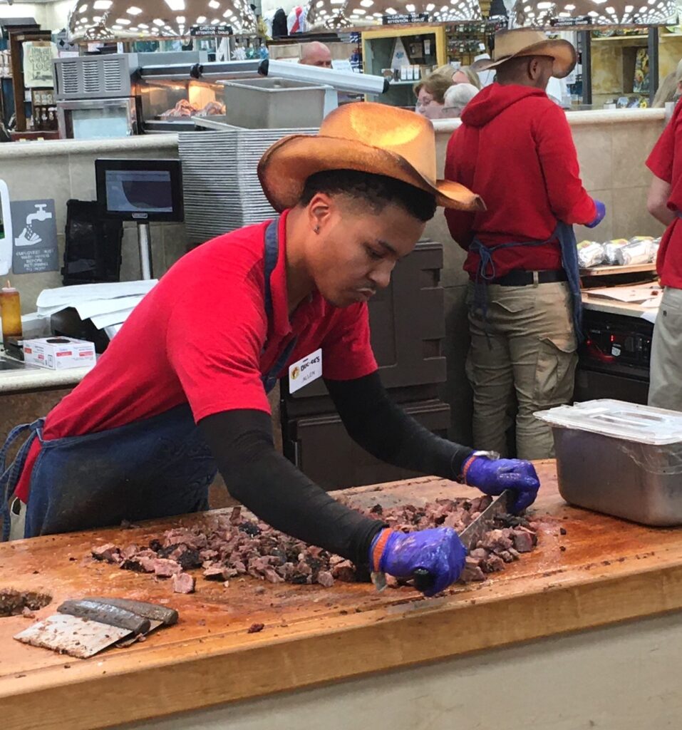 7. An employee at the Buc-ee’s in Florence, South Carolina chops brisket BBQ, one of the best items in the store.