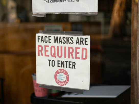 photo of sign on door face masks are required to enter