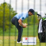 photo of 2022 Wells Fargo golfer signing child's autograph