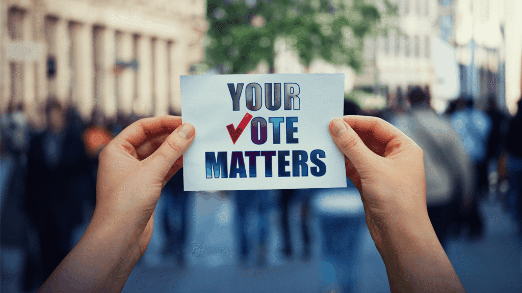 photo of hands holding sign that reads Your Vote Matters