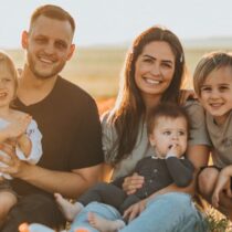 photo of family with three young children