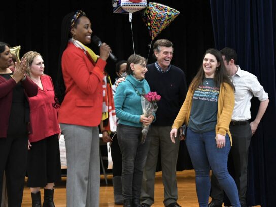 Katie Mendelson onstage along her colleagues