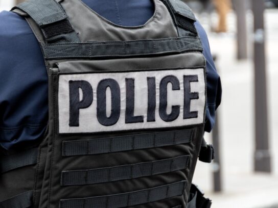 photo of police officer in bulletproof vest