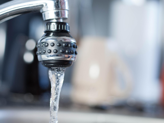 photo of water running from faucet or tap