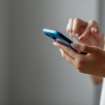 cell phone woman hands