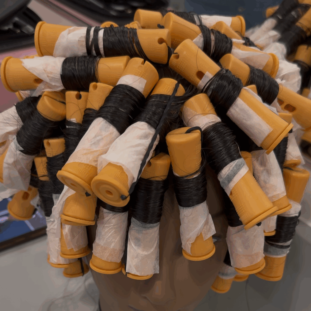 Cosmetology students practice their craft on doll heads like this.