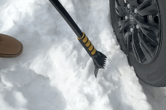 car being shoveled from snow. Photo credit: Jaria Butler