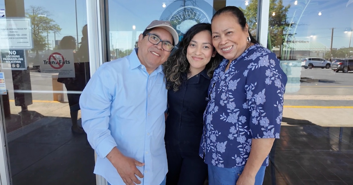 Silvia Huezo (middle) is the second-generation owner of Pupuseria El Comalito. She is photographed with her parents, who started the business.